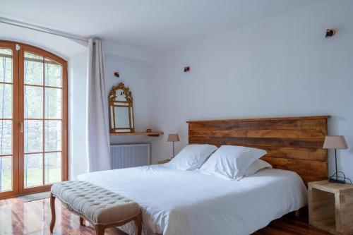 Postel nebo postele na pokoji v ubytování Domaine Acciola