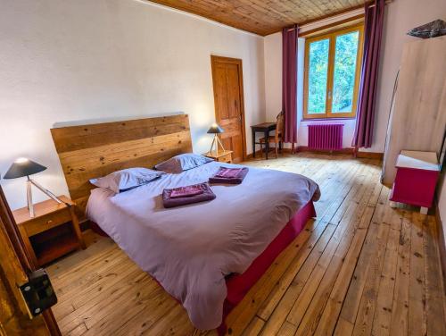 Postel nebo postele na pokoji v ubytování Gite des Vellavi