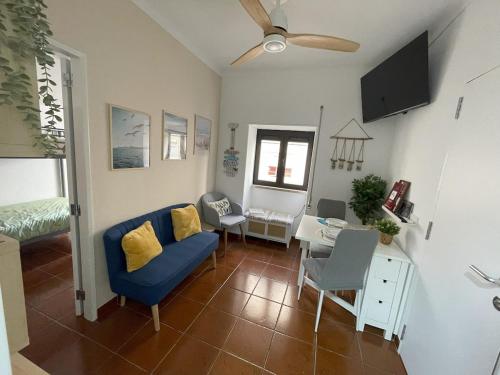 TV a/nebo společenská místnost v ubytování Sesimbra Fé House