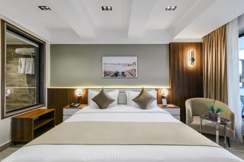 a hotel room with a bed and a window at XU San Stefano Hotel Alexandria in Alexandria