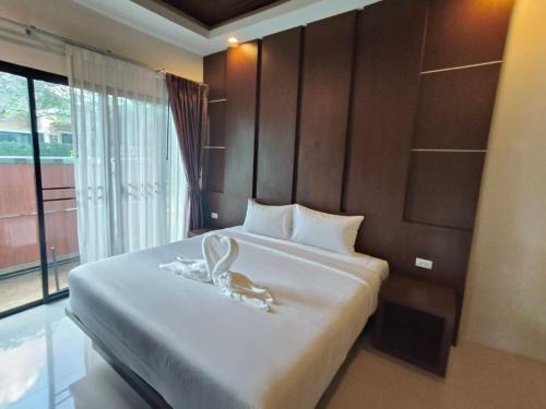 Postel nebo postele na pokoji v ubytování Natural Home Oscar villa