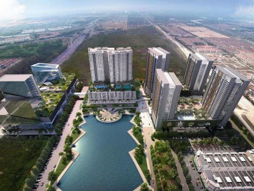 an aerial view of a city with a river and buildings at Wallaway2stay Gravit8 Andaman Klang 2 Queen Room in Klang