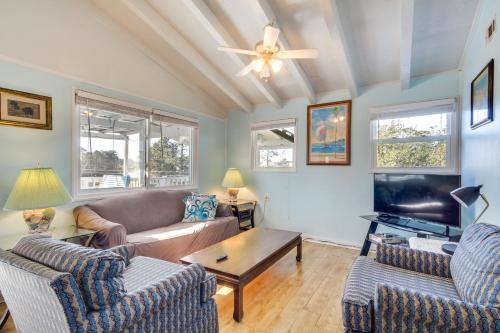 a living room with two couches and a tv at 5 Mi to Beach Bay St Louis Home with Launch and Dock in Shoreline Park