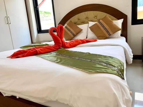 Postel nebo postele na pokoji v ubytování Natural Home The connect soi 2