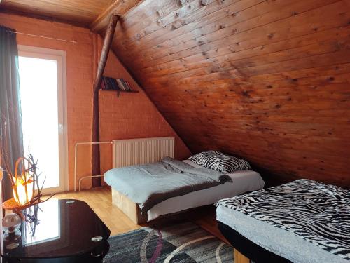 Кровать или кровати в номере House 33