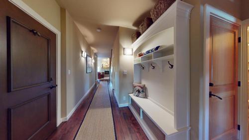 a hallway of a home with a door and a hallway at Wildflower Condo 671 in Sun Valley