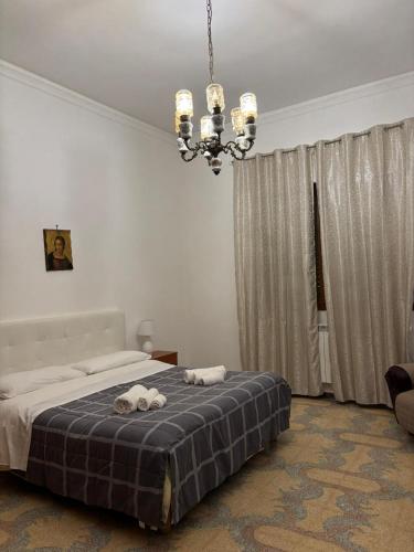 Ένα ή περισσότερα κρεβάτια σε δωμάτιο στο Casa Salento