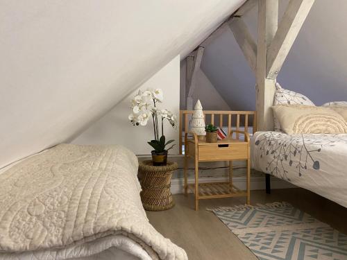 Postel nebo postele na pokoji v ubytování DUPLEX SPACIEUX TOUT CONFORT
