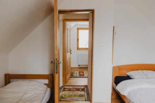 Postel nebo postele na pokoji v ubytování Apartments Paradiso