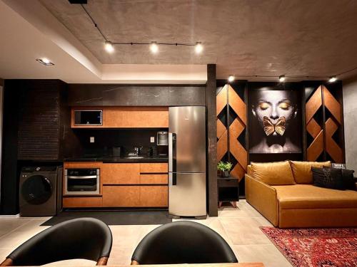 Kuchyň nebo kuchyňský kout v ubytování Lindo Loft próximo ao Iguatemi