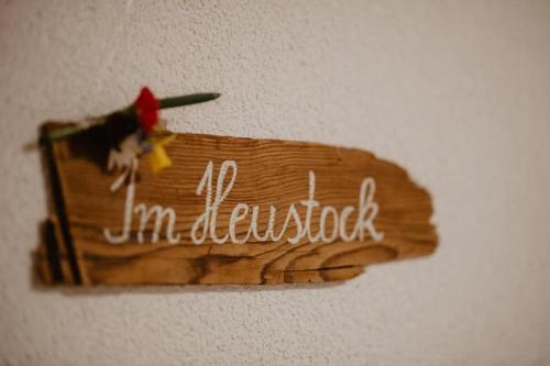 a sign that says im december on a wall at Luxuriöse Schwarzwald Loft Heustock mit Sauna und Whirlpool am Griesbachhof in Titisee-Neustadt