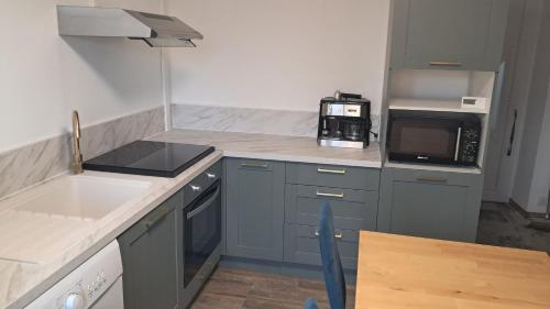 Η κουζίνα ή μικρή κουζίνα στο Appartement 2 à 4 personnes à la campagne