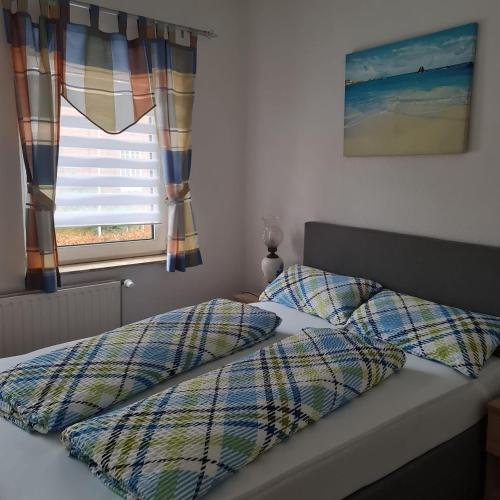 Postel nebo postele na pokoji v ubytování Ferienwohnung Trifkovic 2