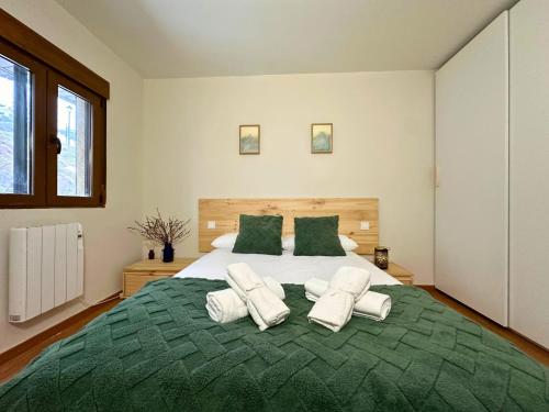 Ένα ή περισσότερα κρεβάτια σε δωμάτιο στο Apartamento Anayet Formigal Centro