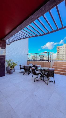 Un balcón o terraza en Apê completo a 4min do Pôr do Sol do Jacaré