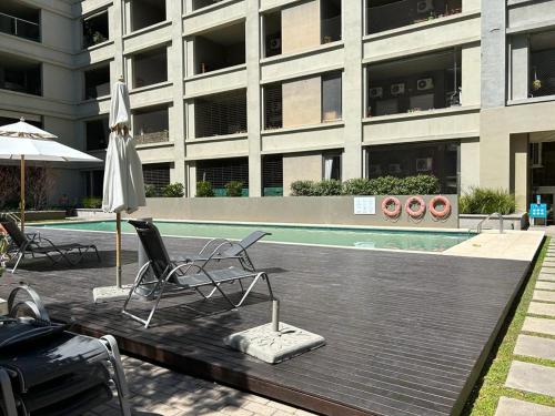 Piscina a Apartamento céntrico o a prop