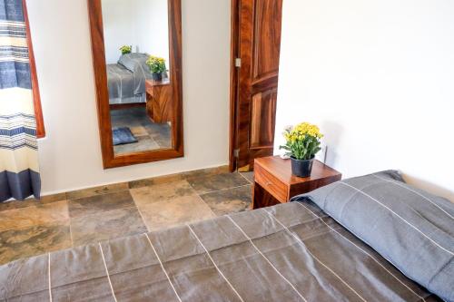 Postel nebo postele na pokoji v ubytování La Aldea Zipolite