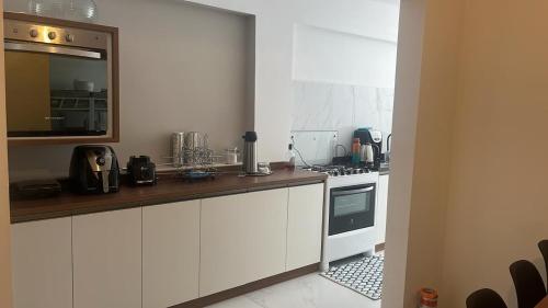 Kuchyň nebo kuchyňský kout v ubytování Terraza Hostel