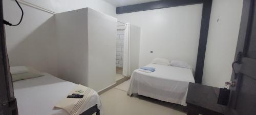 Hotel Adelmo'sにあるベッド