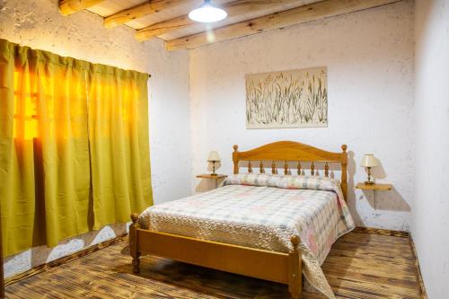 En eller flere senge i et værelse på Coirones del Pedemonte