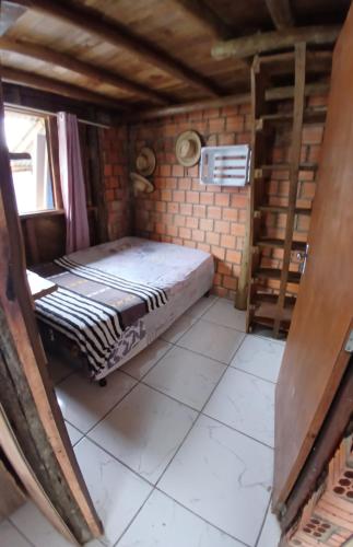 Una cama o camas en una habitación de Cabana 01