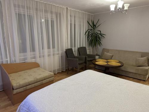 Ruang duduk di Apartamentai šalia baseino