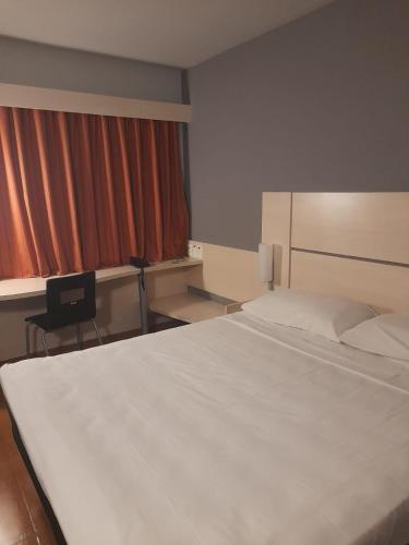 Cama o camas de una habitación en Ibis Joao Pessoa Praia