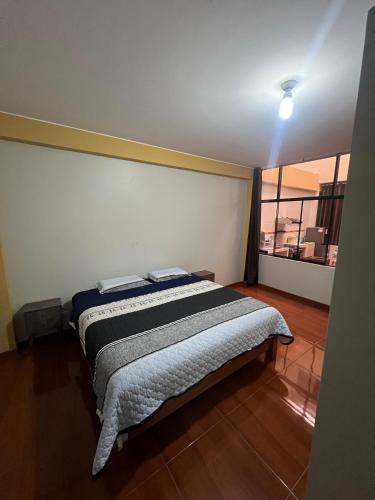 Postel nebo postele na pokoji v ubytování 2da Habitacion a 1 cuadra de la Plaza