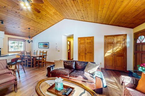 a living room with a couch and a table at Ollie's Place in Breckenridge