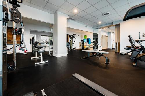 a gym with treadmills and machines in a room at Congress Plaza Hotel Chicago in Chicago