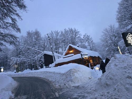 a pile of snow on the side of a road at Villa Hoxha Brezovicë in Brezovicë
