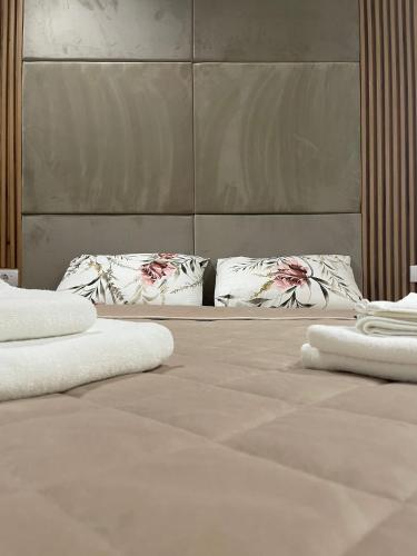 Ένα ή περισσότερα κρεβάτια σε δωμάτιο στο Green Apartment&Spa