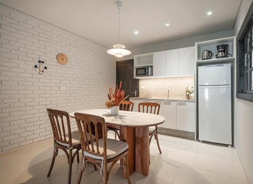 Dapur atau dapur kecil di SUNSET PORTO BELO Locaçoes
