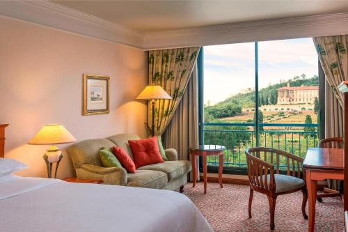 Una cama o camas en una habitación de CT Hotel