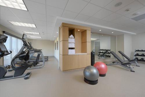 a gym with treadmills and exercise equipment in a room at TownePlace Suites by Marriott Denver South/Lone Tree in Lone Tree