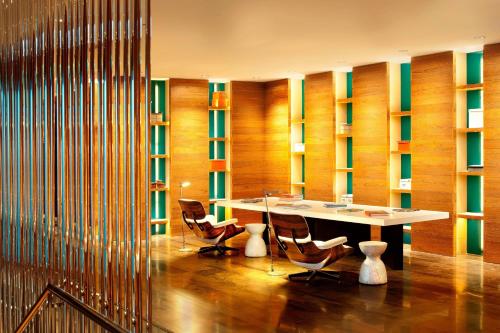 a conference room with a table and chairs at W Taipei in Taipei