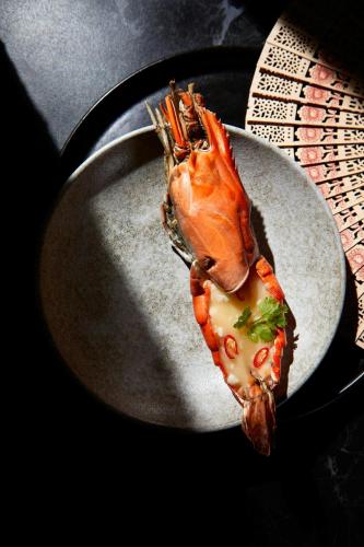 a crab on a plate in a pan at JW Marriott Mumbai Juhu in Mumbai
