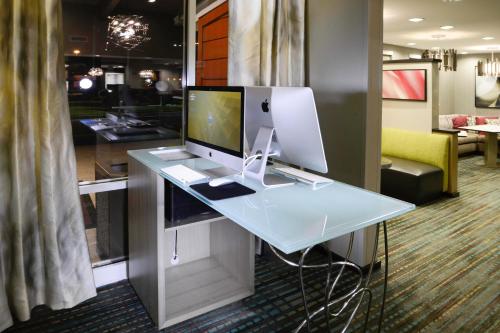 a desk with a computer on top of it at Residence Inn by Marriott Augusta in Augusta