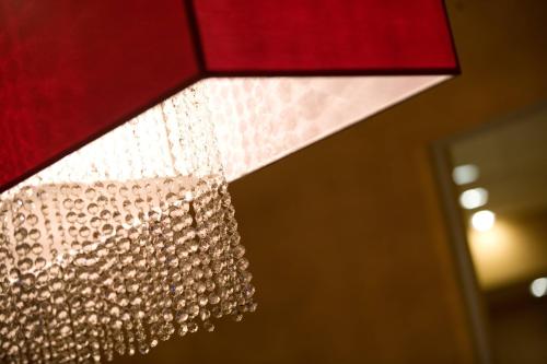 a close up of a chandelier at Falls Church Marriott Fairview Park in Falls Church