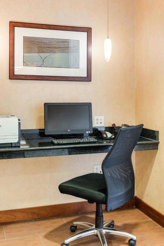 an office with a desk with a computer and a chair at Residence Inn by Marriott Auburn in Auburn