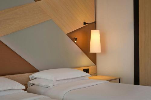Cama o camas de una habitación en Sheraton Amsterdam Airport Hotel and Conference Center