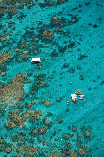 an aerial view of boats in the water at Sheraton New Caledonia Deva Spa & Golf Resort in Bourail