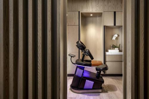 a room with a hair dryer sitting in a room at JW Marriott Edmonton ICE District in Edmonton