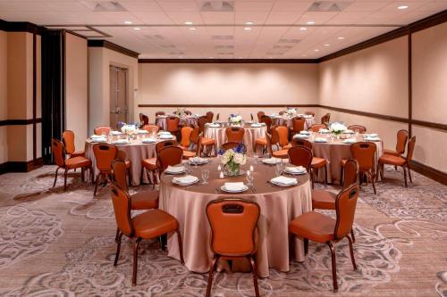 a conference room with tables and chairs in it at Sheraton Houston Brookhollow Hotel in Houston