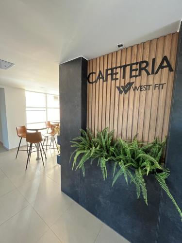 an office with a sign that reads interior sunset hr at Studio Estilo Industrial 03 in Mossoró