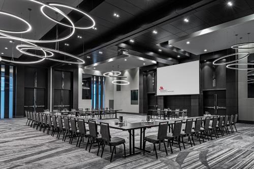 a conference room with a long table and chairs at Toronto Marriott Markham in Markham