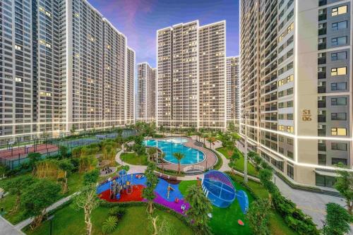 an aerial view of a resort with a water park at Vinhomes Smart City - Vinsmart Tây Mỗ - Homestay - Alo Homestay in Phú Thú
