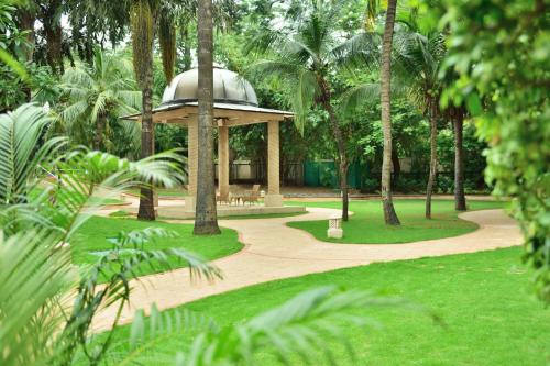 a park with a dome in the middle of a park at Marriott Executive Apartment - Lakeside Chalet, Mumbai in Mumbai