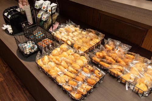 a bunch of food in plastic bags on a counter at Hotel Wing International Shonan Fujisawa in Fujisawa