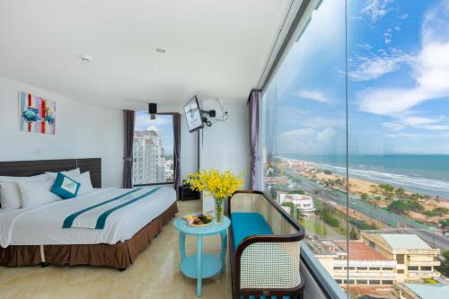 Postel nebo postele na pokoji v ubytování Annata Beach Hotel